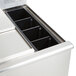 An Eagle Group underbar ice bin with a compartment for ice and eight bottle holders.