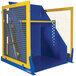 A blue and yellow Vestil self dumping box on a metal rack.