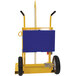 A blue and yellow Vestil welding torch and cylinder cart with wheels and a handle.
