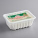 A white plastic container of V&V Supremo Queso Fresco Cheese Crumbles with a green and white label.