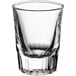 A clear Acopa fluted shot glass on a white background.