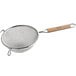 A Vollrath stainless steel double mesh strainer with a wood handle.