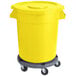 A yellow mobile ingredient storage bin with a lid on a rolling cart.