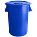 A blue plastic trash can with a lid.