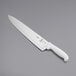 A Mercer Culinary Ultimate White chef knife with a white handle.