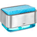 An OXO stainless steel soap dish with a blue sponge in it.