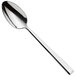 A WMF by BauscherHepp Edita stainless steel serving spoon with a silver handle.