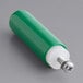 A white and green cylinder with a metal screw.