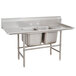 An Advance Tabco stainless steel two-compartment sink with two drainboards.