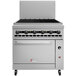 A large stainless steel Wolf liquid propane charbroiler with oven base.