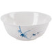 A white bowl with blue bamboo leaves on it.