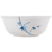 A white melamine bowl with a blue bamboo leaf design.