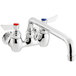 A silver Waterloo wall-mounted faucet with red knobs.