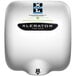 An Excel XLERATOReco hand dryer in white with black text.