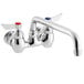 A chrome Waterloo wall-mounted faucet with two red handles.