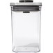 An OXO Good Grips clear square plastic food storage container with a stainless steel lid.