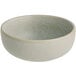 An Acopa Pangea ash matte porcelain ramekin with a gray surface.