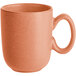 A close up of an Acopa Terra Cotta porcelain cup with a matte finish.