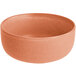 A close up of an Acopa Pangea Terra Cotta Matte Porcelain Bowl with a brown rim.