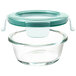 An OXO clear glass container with a leakproof lid.