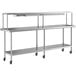 A Regency stainless steel expeditor table with a single overshelf and undershelf on wheels.