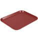 A red rectangular Cambro Camlite tray with a handle.