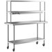A stainless steel Regency work table with double shelves.