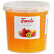 A plastic container of Fanale Peach Popping Boba in orange liquid.