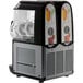 A white Vollrath dual frozen beverage machine with two drinks.