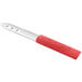 An Outset stainless steel jalapeno corer with a red handle.