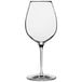 An Anchor Hocking Saporus wine glass with a clear stem and rim.