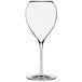 An Anchor Hocking Saporus white wine glass with a clear stem and bottom.
