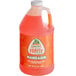 A Jarritos jug of orange liquid.