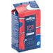 A blue and red bag of Lavazza Top Class Filtro whole bean coffee.