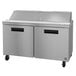 A stainless steel Hoshizaki sandwich top prep refrigerator with two doors on wheels.