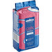 A close-up of a blue and pink package of Lavazza Gran Riserva Filtro Coarse Ground Coffee.