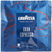 A blue Lavazza packet with red lines and a white label containing Lavazza Gran Espresso Single Serve Espresso Pods.