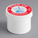 A white container of Fox Run Stick-Um candle adhesive with a red label.