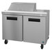 A stainless steel Hoshizaki sandwich top prep refrigerator with two doors.