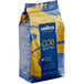 A blue and yellow bag of Lavazza Gold Selection whole bean coffee.