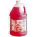 A plastic jug of Carnival King Strawberry Slushy syrup.