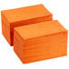 A stack of orange Choice 2-ply paper dinner napkins.