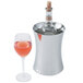 A Vollrath Hourglass wine cooler with a bottle of wine in it and a wine glass