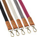 A close-up of Acopa Hazleton mocha leather straps with metal clasps.