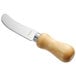 An Acopa stainless steel cheese spreader with a wood handle.