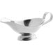 A stainless steel gravy boat with a handle on a white background.