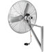 A TPI high-performance industrial wall-mounted fan with a wire attached.