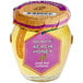 A jar of Dalmatia Acacia Honey with a purple label and lid.
