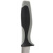 A Dexter-Russell V-Lo Scalloped Utility Knife with a black and grey handle.