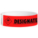 A red and white Carnival King paper wristband with the word "DESIGNATED DRIVER" on it.